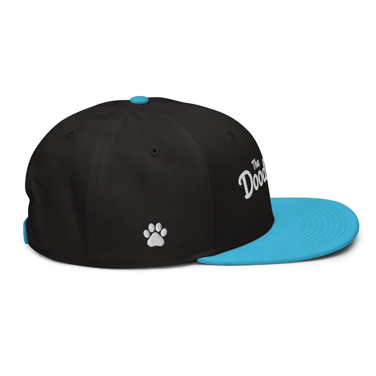 The Doodle Duo black and blue snapback hat with white embroidered signature text and paw print design